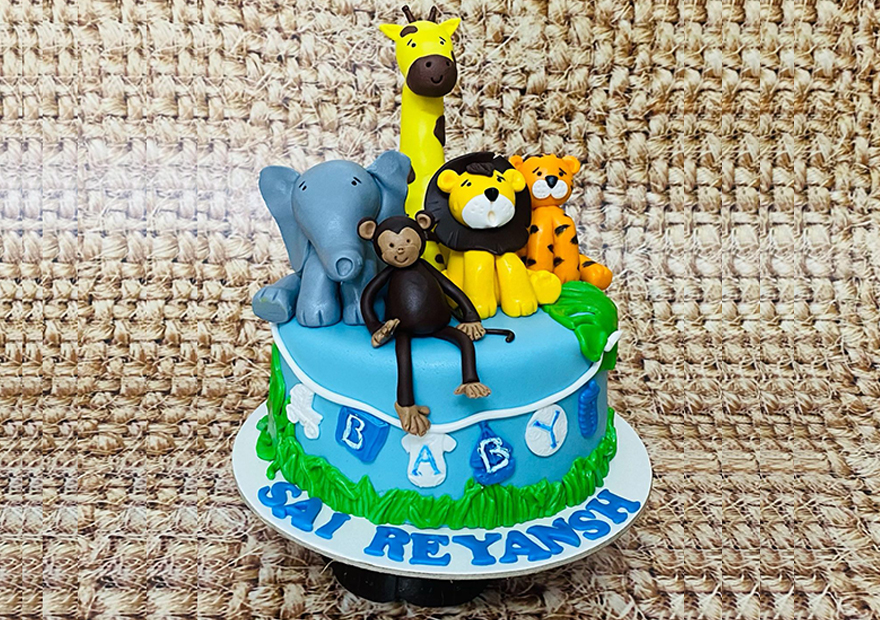 Order 3 KG 2 layer jungle theme cake Jungle animal characters Online From  munflowersncakes,bangalore